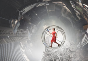 Daily Grind Hamster Wheel with gears in the background